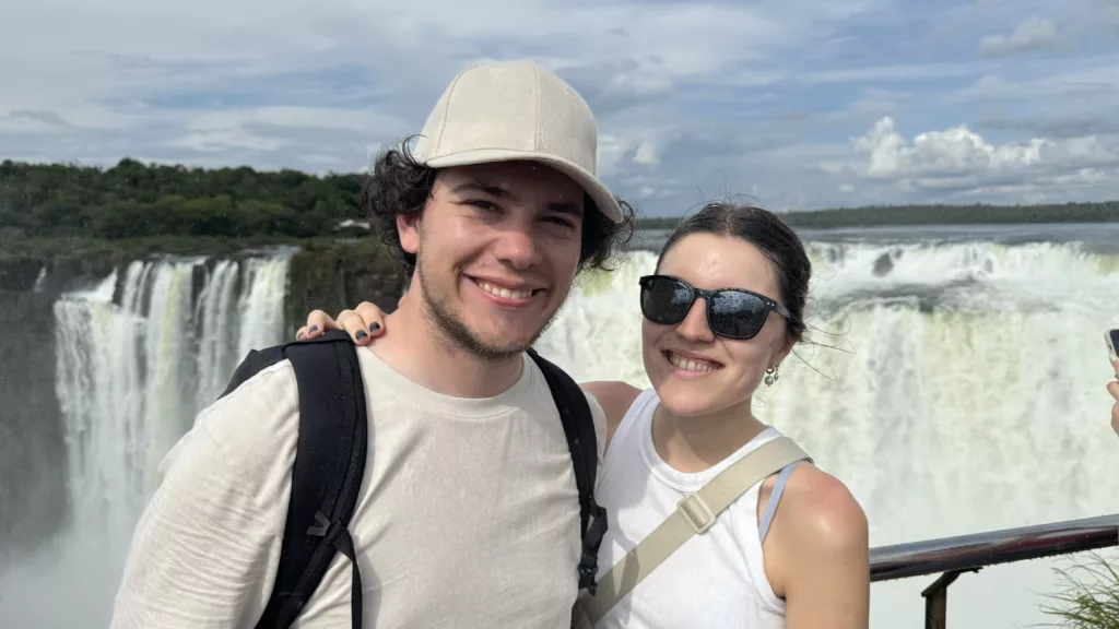 Catu & Arthur in front of the Iguazu falls from the Argentinian side 