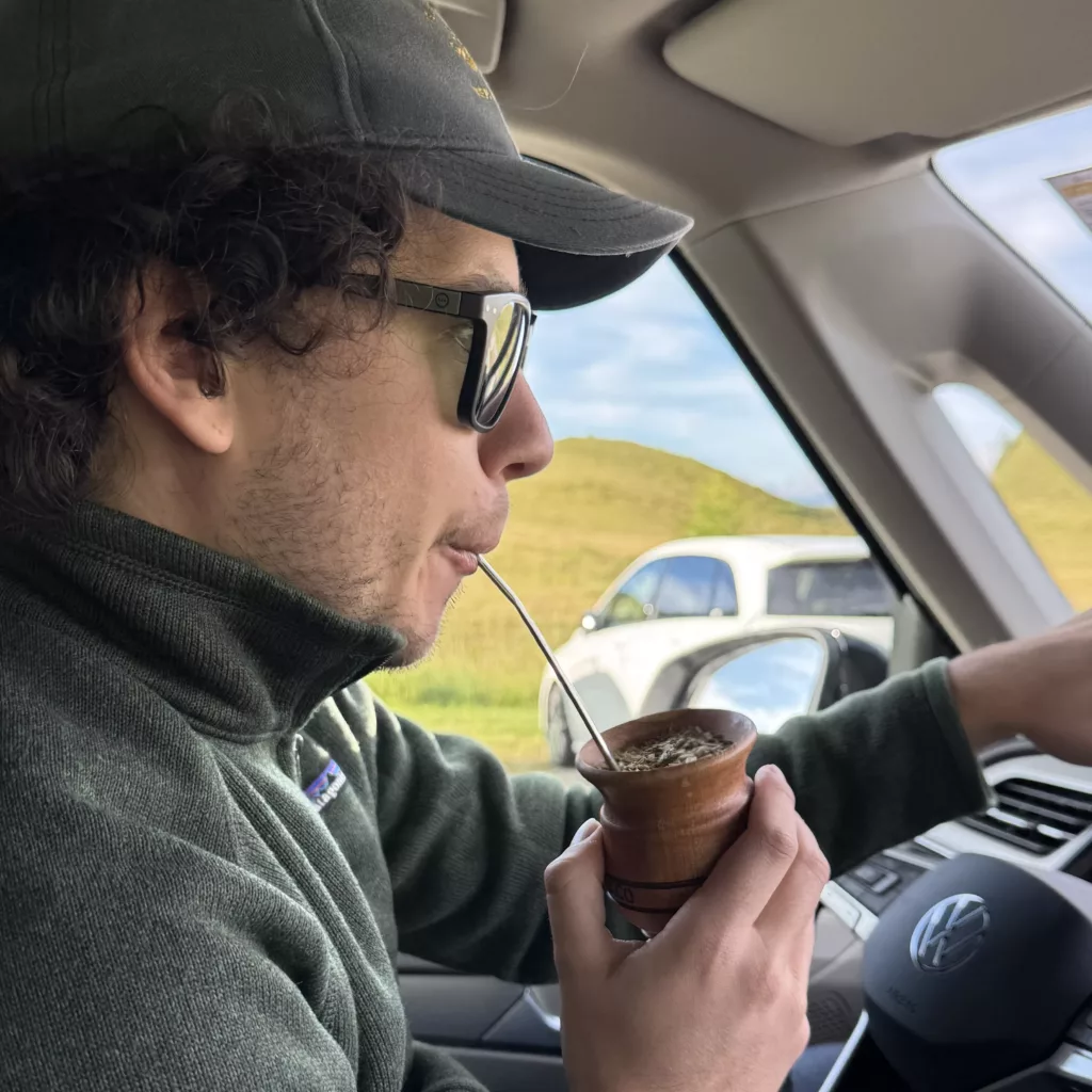 Arthur drinking Mate in the van
