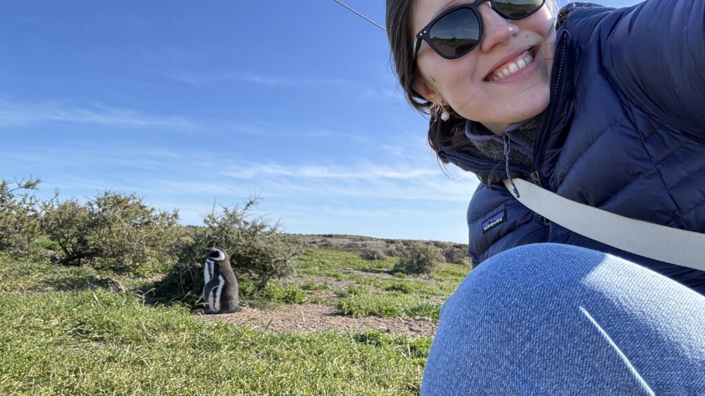 Catu and a magellanic penguin in punta tombo